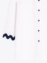 White Blouse with Navy Wave Trim