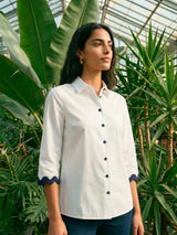 White Blouse with Navy Wave Trim